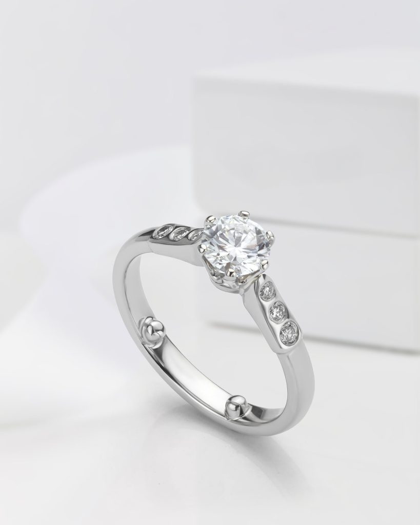 Small balls added to the inside of a bespoke platinum ring to prevent spinning on the finger. 