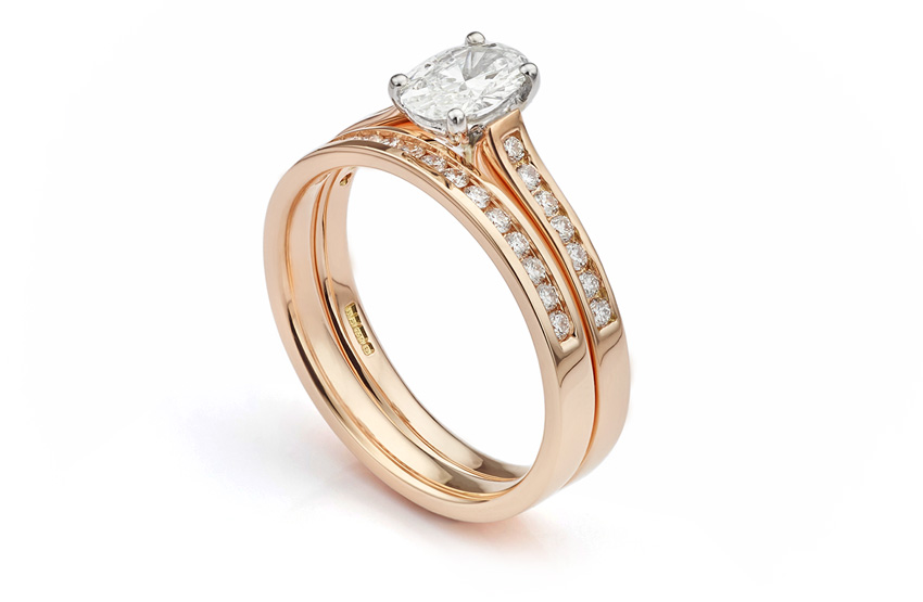 Half diamond eternity ring in rose gold set with Aprils birthstone